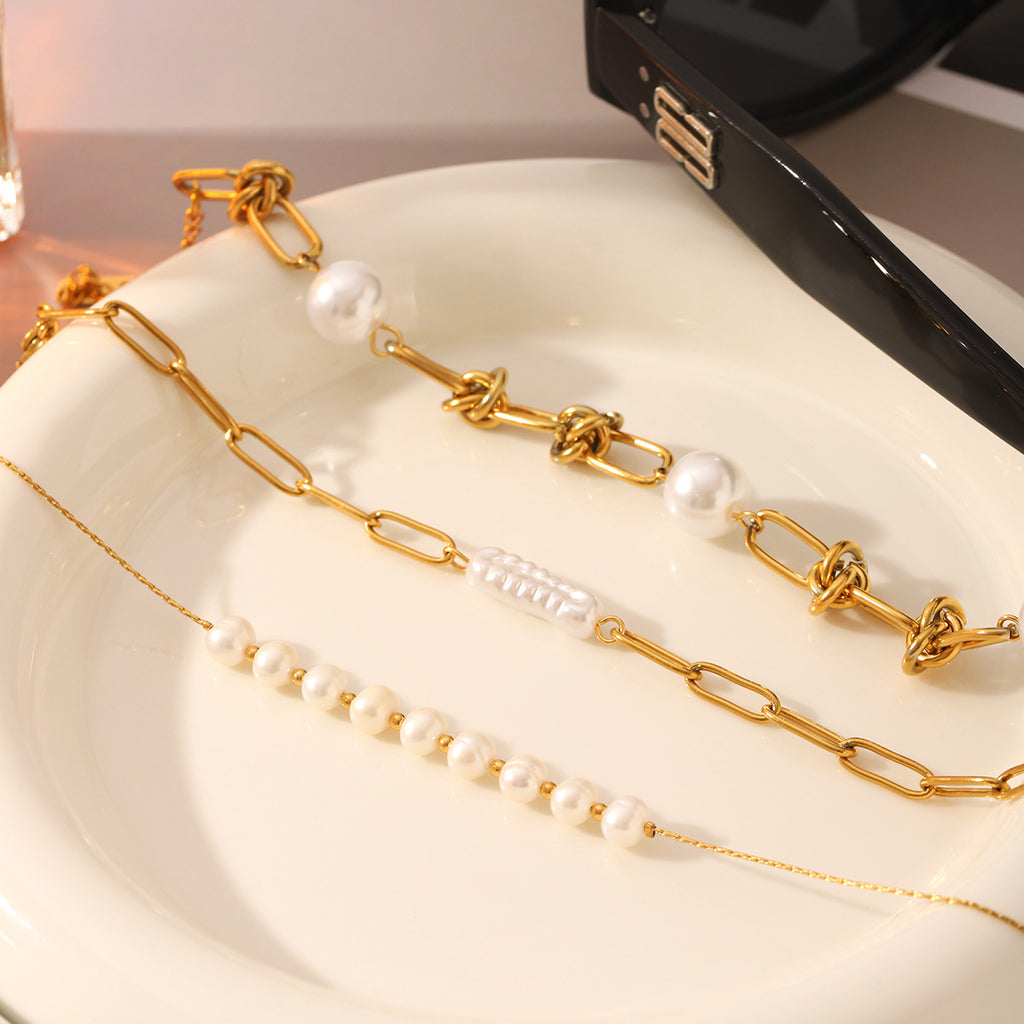 The Pearlescent Twist: Titanium & Inset Pearl Bracelet