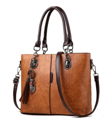 The Grace: Tailored Tassel Shoulder Bag