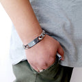 The Iconic Devotion: 10mm Polished Titanium Cross Bracelet
