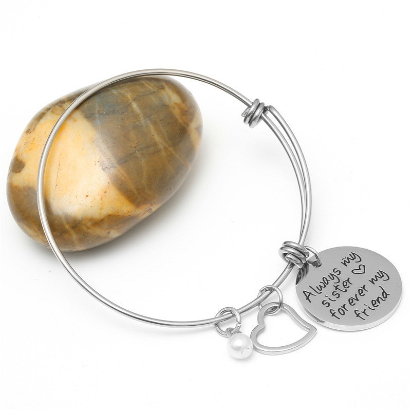 The Minimalist Tag: Adjustable Titanium Steel Bracelet