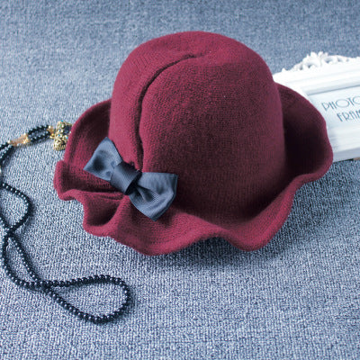 British Heritage: The Elegant Bowler Basin Hat with Bow Detail