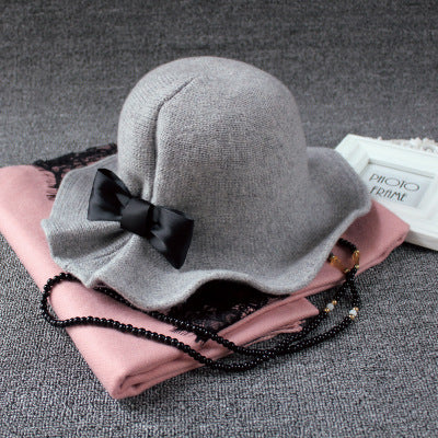 British Heritage: The Elegant Bowler Basin Hat with Bow Detail