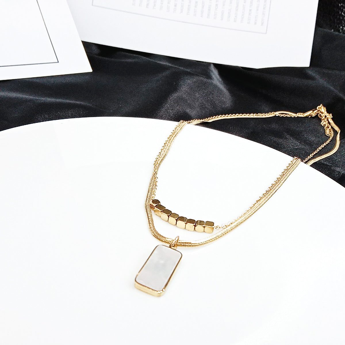 The Iridescent Layer: Mother of Pearl Titanium Necklace