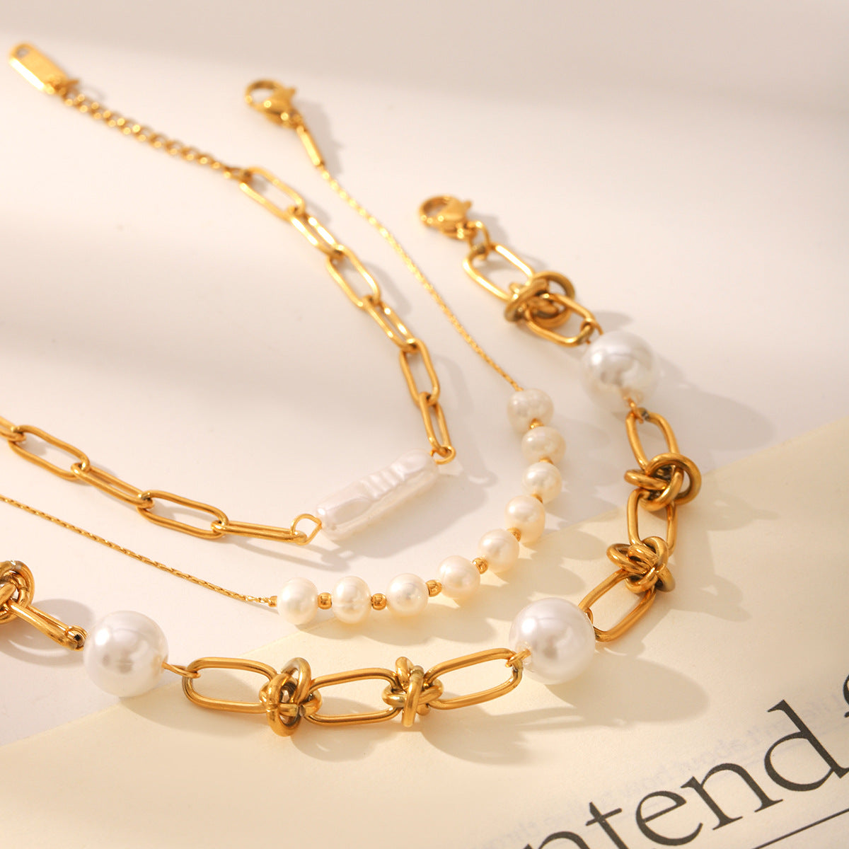 The Pearlescent Twist: Titanium & Inset Pearl Bracelet