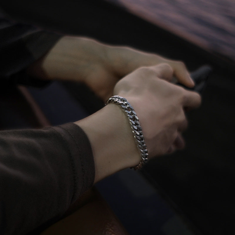 The Sterling Titan: Silver-Inlay Geometric Link Bracelet