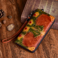 The Curator: Vintage Floral Embossed Leather Clutch