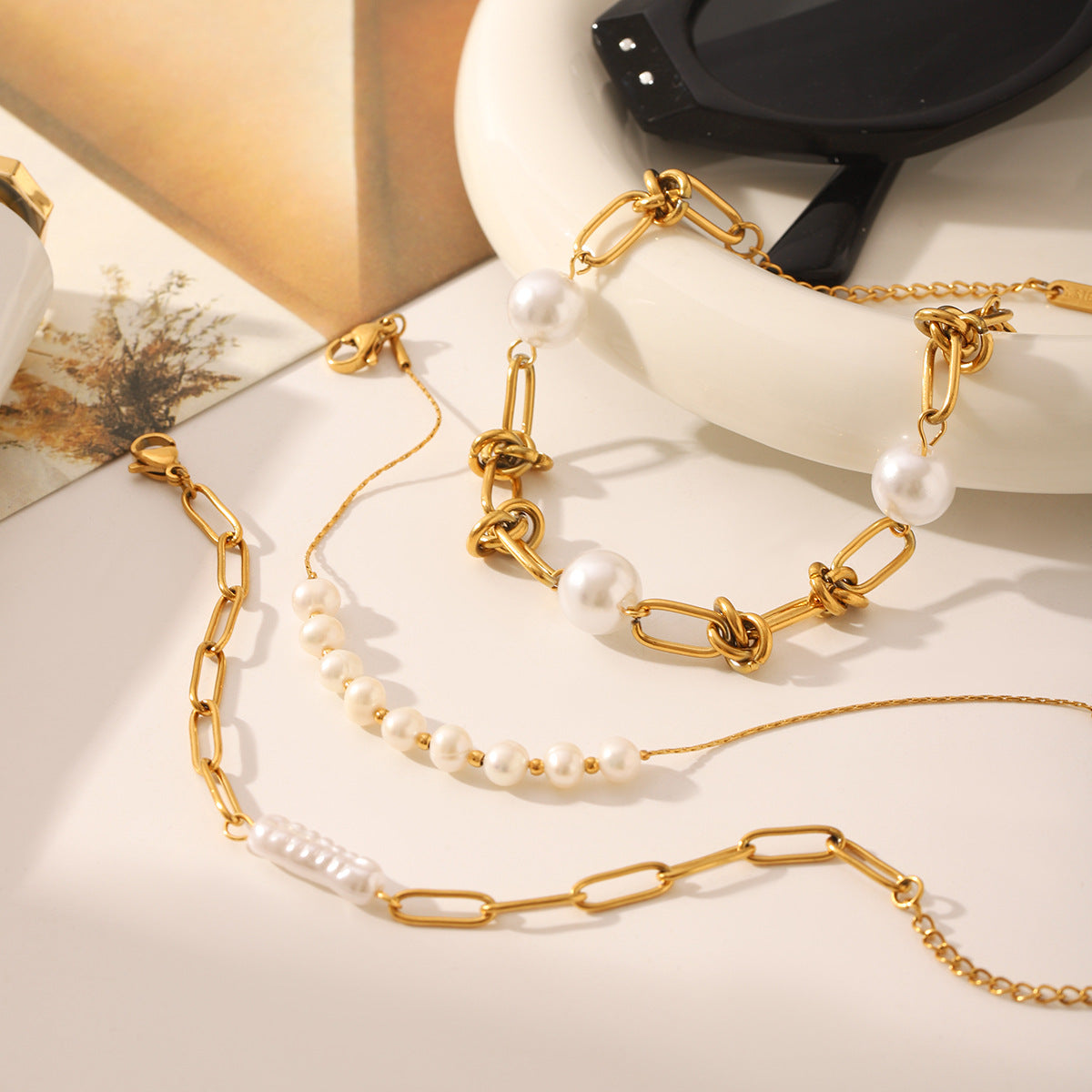 The Pearlescent Twist: Titanium & Inset Pearl Bracelet