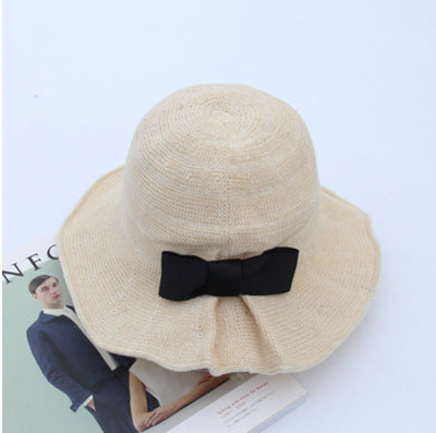 British Heritage: The Elegant Bowler Basin Hat with Bow Detail