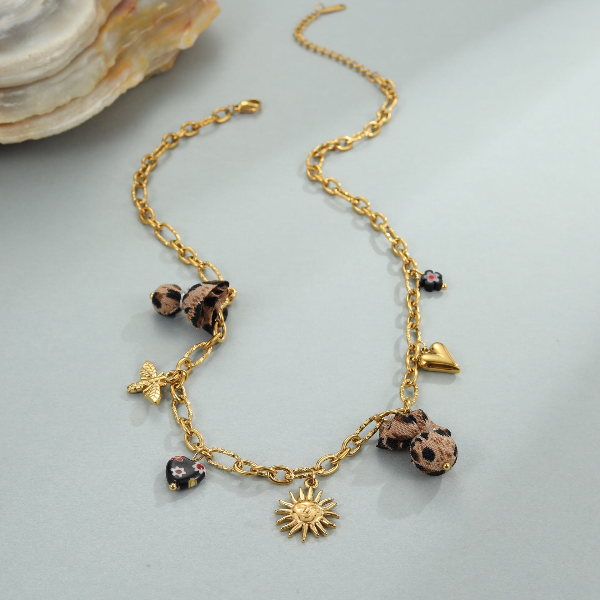 Wild Romance: 18K Gold Plated Leopard & Floral Heart Medallion