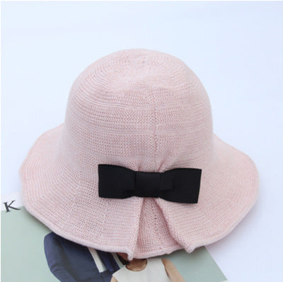 British Heritage: The Elegant Bowler Basin Hat with Bow Detail
