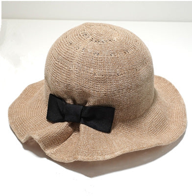 British Heritage: The Elegant Bowler Basin Hat with Bow Detail