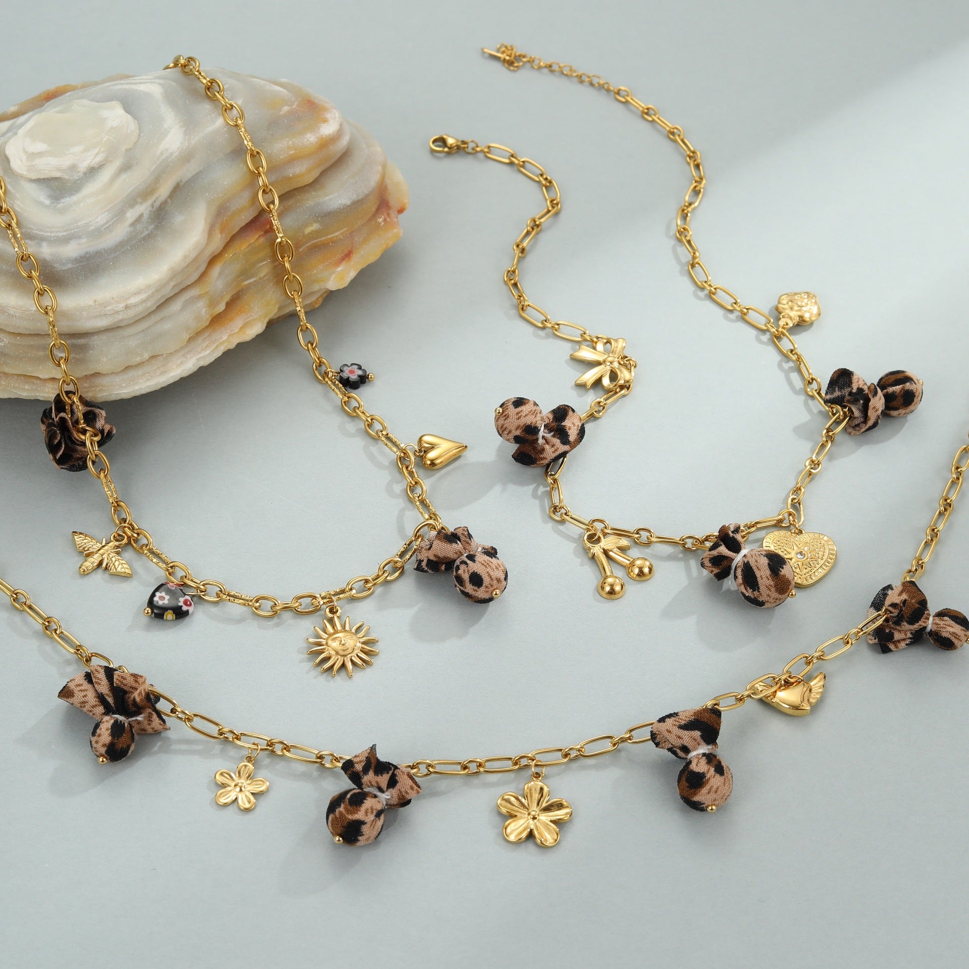 Wild Romance: 18K Gold Plated Leopard & Floral Heart Medallion