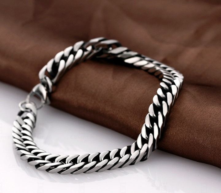 The Sterling Titan: Silver-Inlay Geometric Link Bracelet